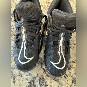 Nike football cleats. Used for 7 games. Still in very good condition kids size 1